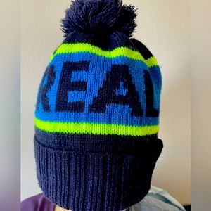 Calling all fútbol fans!  Real Madrid Pom Pom Cuffed Beanie Hat.